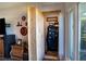 Hidden safe room with a Liberty safe and wood-paneled door at 3340 Crump Rd, Winter Haven, FL 33881