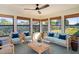Bright sunroom with wicker furniture at 3340 Crump Rd, Winter Haven, FL 33881