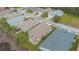 Aerial view of house and neighborhood, showcasing landscaping and location at 340 Lake Suzanne Dr, Lake Wales, FL 33859