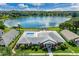 Community clubhouse with pool and lake view at 340 Lake Suzanne Dr, Lake Wales, FL 33859