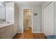 Main bathroom with double sinks and separate shower and toilet area at 340 Lake Suzanne Dr, Lake Wales, FL 33859