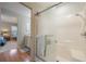 Bathroom with shower, vanity, and linen closet at 340 Lake Suzanne Dr, Lake Wales, FL 33859