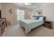 Guest bedroom with ceiling fan and neutral decor at 340 Lake Suzanne Dr, Lake Wales, FL 33859