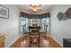 Cozy breakfast nook with bay window and wood flooring at 340 Lake Suzanne Dr, Lake Wales, FL 33859