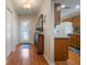 Hardwood floor entryway, with a console table and mirror at 340 Lake Suzanne Dr, Lake Wales, FL 33859