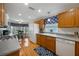 Spacious kitchen with wood cabinets, ample counter space, and breakfast nook at 340 Lake Suzanne Dr, Lake Wales, FL 33859