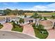 House nestled in a community with palm trees at 3457 Raleigh Dr, Winter Haven, FL 33884