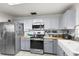 Recently updated kitchen with stainless steel appliances and butcher block countertops at 3457 Raleigh Dr, Winter Haven, FL 33884