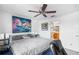 Relaxing main bedroom with a king-size bed and stylish artwork at 3457 Raleigh Dr, Winter Haven, FL 33884
