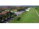 Aerial view of houses and golf course community at 3834 Litchfield Loop, Lake Wales, FL 33859
