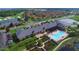 Aerial view of community with clubhouse, pool, and golf course at 3834 Litchfield Loop, Lake Wales, FL 33859