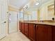 Elegant bathroom with double vanity and large shower at 3834 Litchfield Loop, Lake Wales, FL 33859