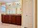 Spa-like bathroom with double sinks and a walk-in shower at 3834 Litchfield Loop, Lake Wales, FL 33859