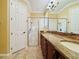 Elegant bathroom with granite countertops, double sinks, and a walk-in shower at 3834 Litchfield Loop, Lake Wales, FL 33859
