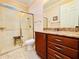 Bathroom with walk-in shower, toilet and vanity at 3834 Litchfield Loop, Lake Wales, FL 33859