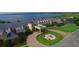 Luxury clubhouse with fountain and landscaping, offering resort-style living at 3834 Litchfield Loop, Lake Wales, FL 33859