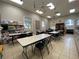 Community clubhouse craft room with tables and chairs at 3834 Litchfield Loop, Lake Wales, FL 33859