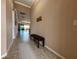 Bright and spacious entryway with tile floors and bench at 3834 Litchfield Loop, Lake Wales, FL 33859