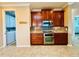Well-equipped kitchen with granite counters and stainless steel appliances at 3834 Litchfield Loop, Lake Wales, FL 33859