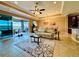 Living room with access to a relaxing outdoor patio area at 3834 Litchfield Loop, Lake Wales, FL 33859
