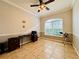 Home office with ceiling fan and large arched window at 3834 Litchfield Loop, Lake Wales, FL 33859