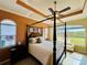 Primary bedroom with a view and plenty of natural light at 3834 Litchfield Loop, Lake Wales, FL 33859