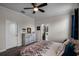 Bright bedroom with a dresser and ensuite bathroom access at 3946 Bedford Ave, Winter Haven, FL 33884