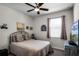 Comfortable bedroom with a queen-size bed and large window at 3946 Bedford Ave, Winter Haven, FL 33884