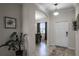 Bright and airy entryway with tile flooring and view to dining area at 3946 Bedford Ave, Winter Haven, FL 33884