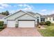 Attractive single-story home with two-car garage and brick driveway at 3946 Bedford Ave, Winter Haven, FL 33884