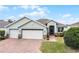 Attractive single-story house with two-car garage and landscaped yard at 3946 Bedford Ave, Winter Haven, FL 33884