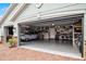 Garage with ample space, workbench, and classic car at 3946 Bedford Ave, Winter Haven, FL 33884