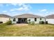Single-Gathering home with backyard and screened patio at 3946 Bedford Ave, Winter Haven, FL 33884