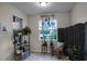 Cozy kitchen nook with a window seat, and various plants at 3946 Bedford Ave, Winter Haven, FL 33884