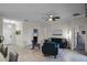 Living room with ample natural light and view of kitchen and entryway at 3946 Bedford Ave, Winter Haven, FL 33884
