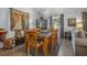 Light and airy dining room with a wooden table and six chairs at 3966 Oak Loop # 13, Mulberry, FL 33860