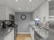 Bright kitchen featuring stainless steel appliances and ample counter space at 3966 Oak Loop # 13, Mulberry, FL 33860