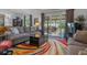 Spacious living room with comfy seating, large TV, and access to backyard at 3966 Oak Loop # 13, Mulberry, FL 33860