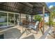 Relaxing covered patio with seating area and pavers at 3966 Oak Loop # 13, Mulberry, FL 33860