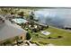 Community clubhouse with pool and landscaped gardens at 4193 Limerick Dr, Lake Wales, FL 33859