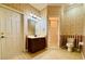 Main bathroom with tile floors, vanity, and shower/tub combo at 4193 Limerick Dr, Lake Wales, FL 33859