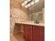 Bathroom featuring a double vanity and updated fixtures at 4193 Limerick Dr, Lake Wales, FL 33859