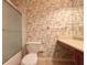 Bright bathroom with a toilet, shower, and vanity at 4193 Limerick Dr, Lake Wales, FL 33859