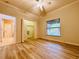 Bright bedroom featuring a large closet and wood-look floors at 4193 Limerick Dr, Lake Wales, FL 33859