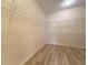 Spacious closet with wire shelving and wood-look floors at 4193 Limerick Dr, Lake Wales, FL 33859
