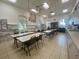 Bright community craft room with tables and chairs at 4193 Limerick Dr, Lake Wales, FL 33859