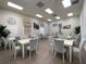 Community dining room with tables and chairs for residents at 4193 Limerick Dr, Lake Wales, FL 33859