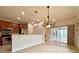 Bright dining room with chandelier and access to the patio at 4193 Limerick Dr, Lake Wales, FL 33859