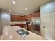 Kitchen boasts stainless steel appliances and ample counter space at 4193 Limerick Dr, Lake Wales, FL 33859