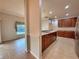 Kitchen with island and a view into the dining area at 4193 Limerick Dr, Lake Wales, FL 33859